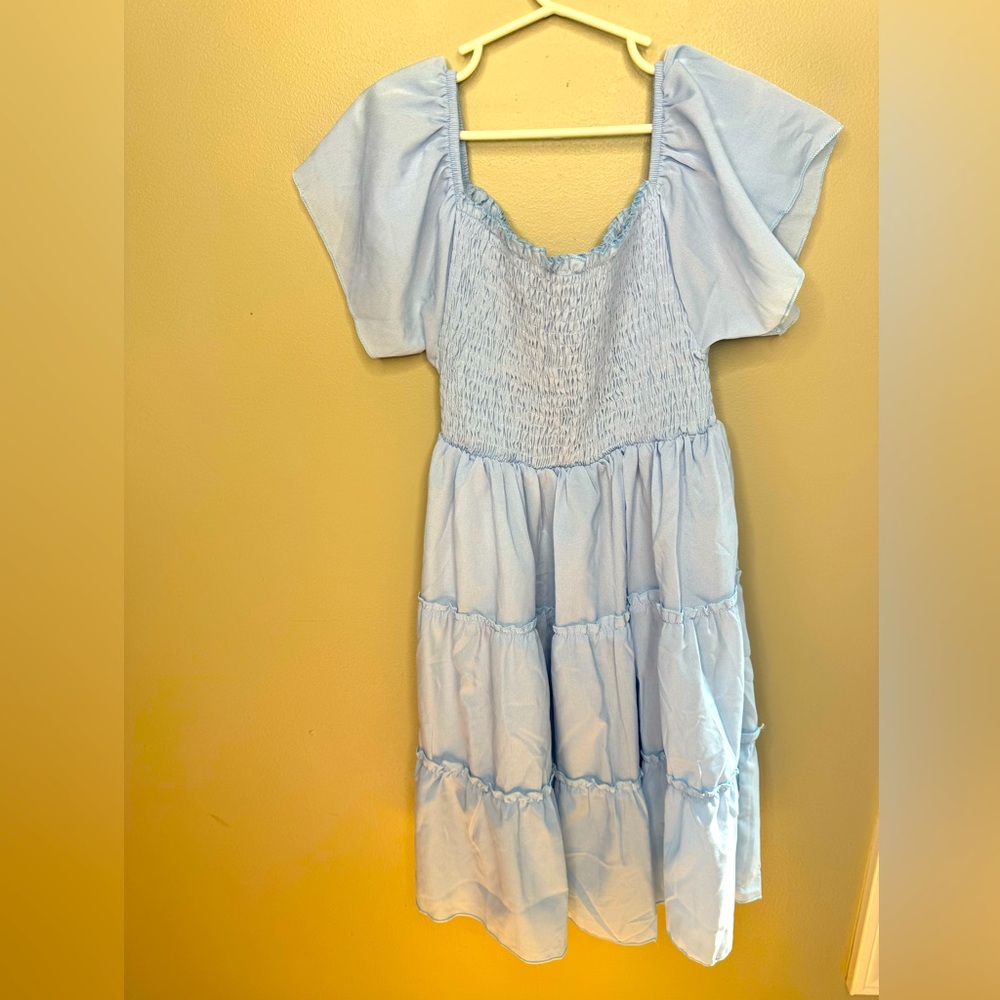 Pretty blue dress size 10 worn once for pictures no brand name.
